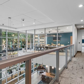 Enduring Style. Unparalleled Comfort. second story lobby with conference room
