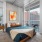 carpeted bedroom with city views